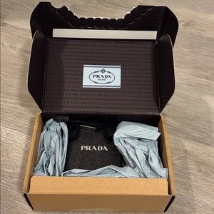 PRADA box and tissue paper and authenticity cards (from bracelet)